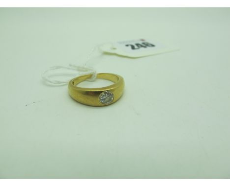 A Single Stone Diamond Ring, the brilliant cut stone inset within plain tapering band, stamped "18" (finger size M) (6grams).