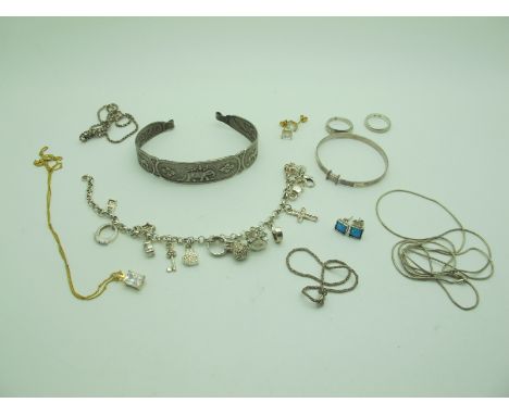 A Novelty Charm Bracelet, suspending assorted charm pendants, stamped "925", child's expanding bangle stamped "925", "925" gi