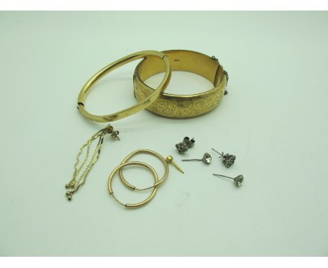 A Wide Hinged Bangle, part etched scroll design, stamped "9ct Metal Core", another bangle of plain design (damages) stamped "