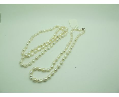 A Modern Fresh Water Pearl Bead Necklace, circular and irregular beads, knotted to clasp stamped "925"; Together with A Longe