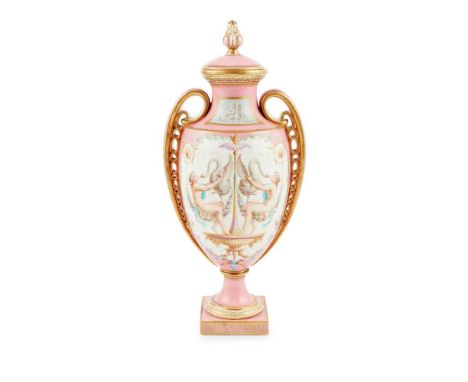 MINTON PINK GROUND VASE AND COVER CIRCA 1850-60 with pierced twin handles, the domed cover with a leaf finial, the body paint