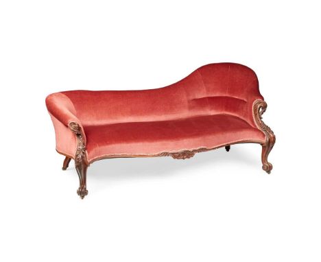 VICTORIAN MAHOGANY SPOONBACK SOFA MID 19TH CENTURY the serpentine back above a serpentine stuffover seat, the frame carved wi