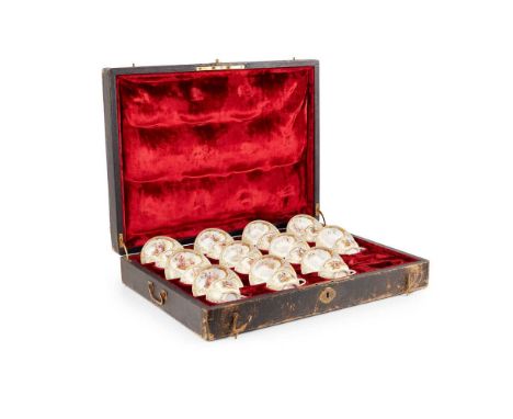 KPM BERLIN PORCELAIN CASED TEA SERVICE LATE 19TH CENTURY comprising eleven cups and saucers; each piece painted with two pane