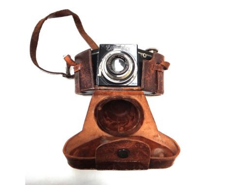 An Exacta VP camera, circa 1930, serial No 411832, in leather case with instruction manual and an 'Excelsior' light meter in 