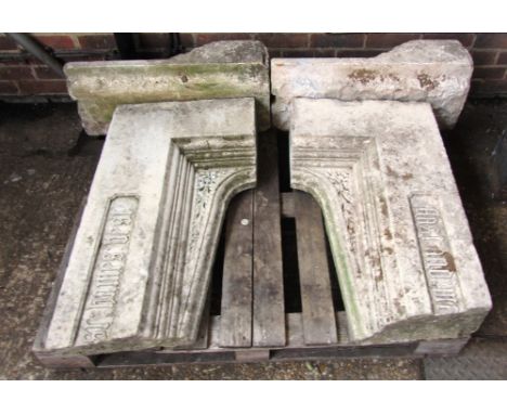 An early Victorian carved stone fire surround, 223cm wide x 167cm high, the aperture 92cm high (at highest point) x 106cm wid