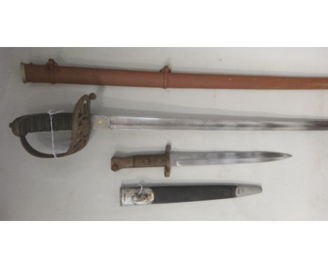 A Wilkinson coldstream guard's officer's dress sword with slightly curved engraved steel blade stamped 5014 (78.5cm), pierced