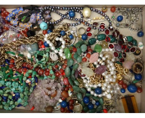 A graduated faceted reconstituted amber bead necklace, a simulated amber bead necklace, a quantity of branch corals, a red pa