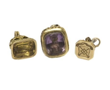 A two colour gold and citrine set pendant fob seal, designed as bunches of grapes with vine leaves, engraved with the initial