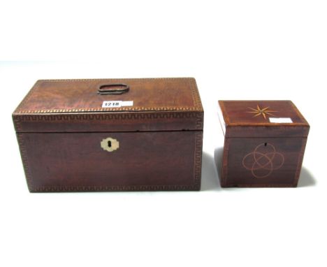 A late George III large tea caddy, possibly colonial, with crenulated inlaid border enclosing two canisters and a reserve, 31