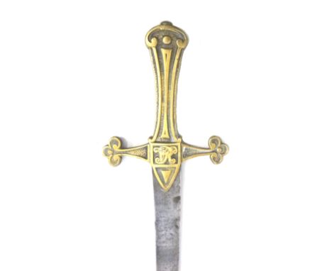 A Victorian Gothic brass hilted bandsmen's short sword, with slightly curved steel blade (55cm) and brass cross guard hilt wi