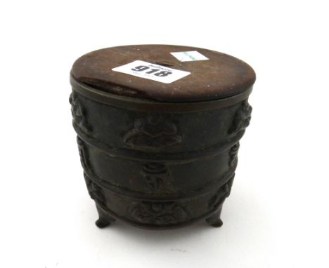 A Chinese Ming style bronze censer, of cylindrical form, cast with a   central band of characters between bands of foliate mo