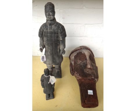 A Chinese basalt ceramic warrior figure (35cm high), one similar smaller and an African carved wooden figure head. (3)
