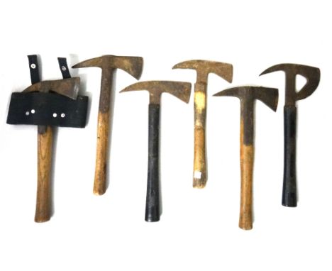 Six military axes, a machete stamped J.J.B. 1942, a kukri with leather scabbard, and one other machete type knife (9).