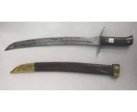 A Dutch 'Klewang' cutlass, early 20th century, with curved single edged steel blade stamped 'Hembrug', shaped crossguard and 