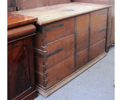 A large 19th century brass bound oak trunk with side carry handles, 150cm wide.

Provenance:  Bramshill House Police Training
