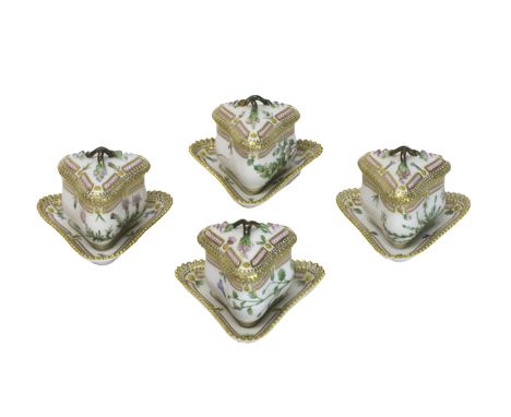 Four Copenhagen 'Flora Danica' chocolate cups, covers and stands, each of triangular form with foliate moulding to the base w