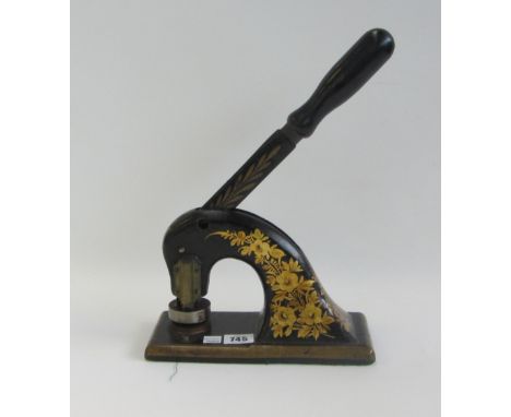 A Victorian cast iron press seal decorated with gilt flowers, the circular matrix detailed 'James Hadley and Sons Ltd, Worces