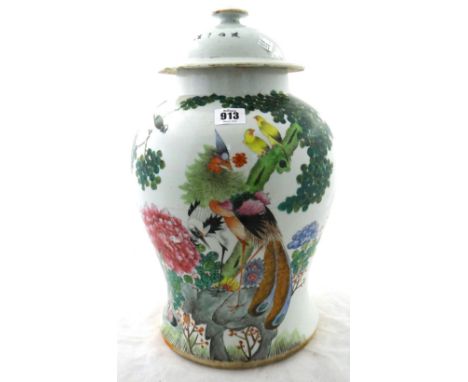 A Chinese famille-rose broad baluster vase and cover, 20th century, painted with birds on rocks and in branches and with two 