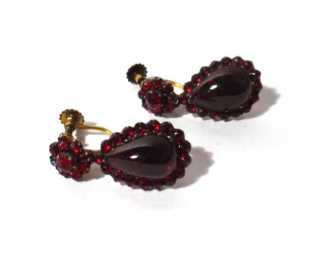 A pair of Bohemian garnet and carbuncle garnet set earrings, each drop mounted with a carbuncle garnet at the centre, within 