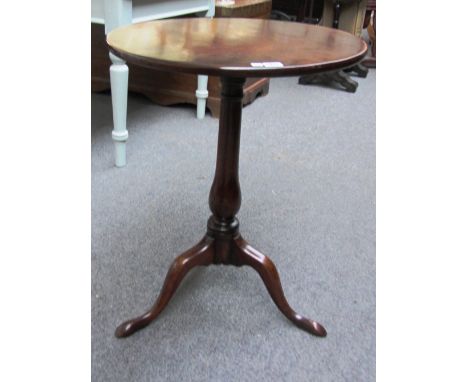 An 18th century mahogany circular snap top occasional table on tripod base, 55cm wide.