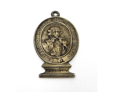 A theatre pass of oval form, the obverse with a portrait of Shakespeare at the centre and detailed to the surround, Into Any 