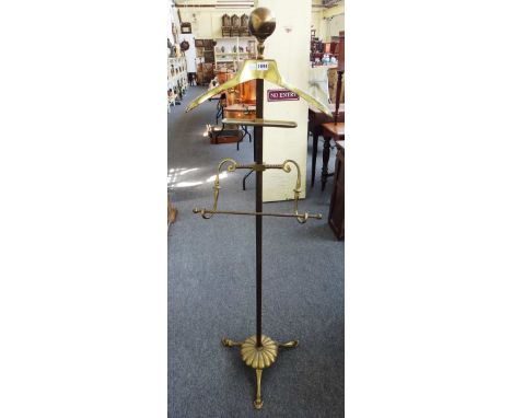 An Edwardian brass gentleman's vanity stand, on a tripod base. 146cms high
