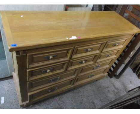 A modern light oak American chest of ten short drawers, 40 1/4h x 56w