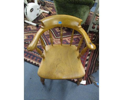A pine Captain's chair on bobbin turned legs