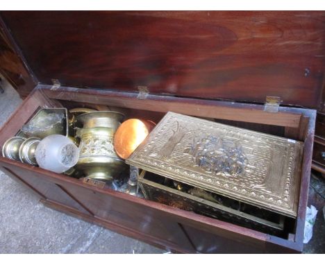 A Victorian mahogany trunk containing a large quantity of mixed brassware and copper