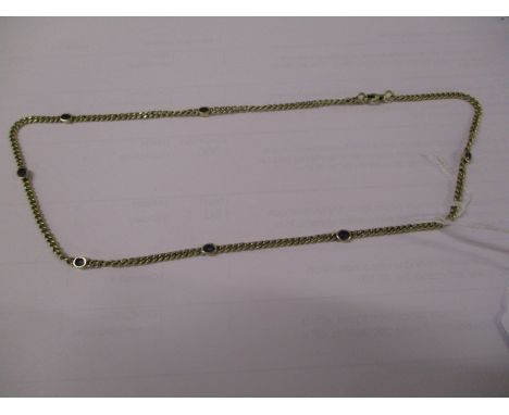 A 14ct gold and sapphire chain, 16g