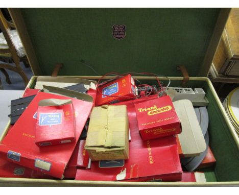 A Triang Minic Railways and Motorways part set, some boxed in a 1960s Smith's Trunk Stores pig skin suitcase