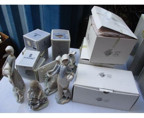 Lladro and Nao, boxed and loose, to include one of a girl with a goose and a dog