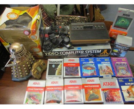 A retro Atari video game console with twelve games, all boxed and a Dr Who radio controlled Dalek