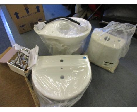 A Madrid Cistern, toilet, sink basin, together with a chrome mixer tap, a bath mixer tap and plug, brand new and packaged