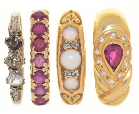 A PEAR SHAPED RUBY RING IN GOLD, SIZE O, 3.5G, AN OPAL RING IN GOLD, SIZE O, A RUBY RING IN 9CT GOLD, SIZE N, AND ANOTHER GEM