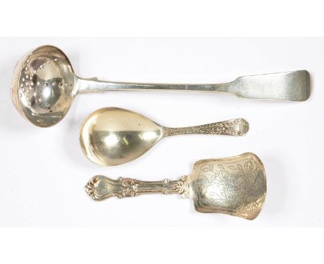 A SCOTTISH GEORGE III SILVER SIFTER, EDINBURGH 1816, A GEORGE III SILVER CADDY SPOON, LONDON 1787 AND A VICTORIAN SILVER CADD