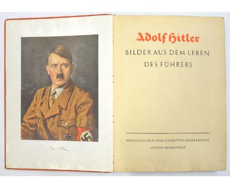 ADOLF HITLER. A GERMAN CIGARETTE CARD ALBUM OF BLACK AND WHITE PHOTOGRAPHS, PUBLISHED BY CIGARETTEN - BILDERDIENST, CLOTH BAC