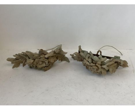 Pair of modern carved wood single light wall sconces 