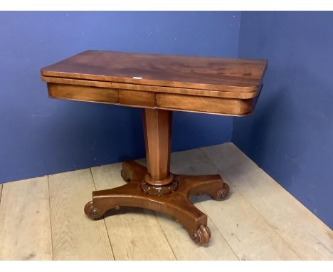 Late Regency mahogany fold over pedestal card table with circular green baize interior 92cmL.  Condition generally good, wear