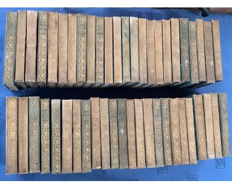 A quantity of Vintage green vellum bound books, of classical works, including Burns, Rusking etc 