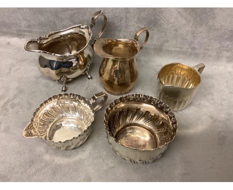 Hallmarked silver embossed cream jug and basin Frazer Haws.  Garrards. 31 Regent Street 1882/3  4.47 ozt.  3 other cream jugs