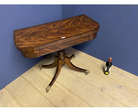 Regency figured mahogany card table supported by 4 sweeping legs leading to canthus leaf brass casters , 91cm square open 