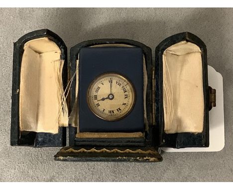 A miniature travelline Timepiece with blue enamel case retailed by Harrods 3.75 cm H leather case - worn 