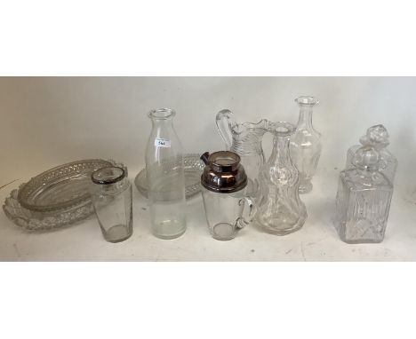 2 bright cut crystal oval dishes, epergne stand, water jug, cocktail jug.  Hallmarked silver measure and 4 assorted decanters