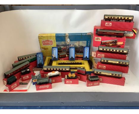 A quantity of Hornby Dublo and a quantity of boxed Hornby dublo, including, Salt wagon, Hopper wagon, Banana Van, Coal wagon,