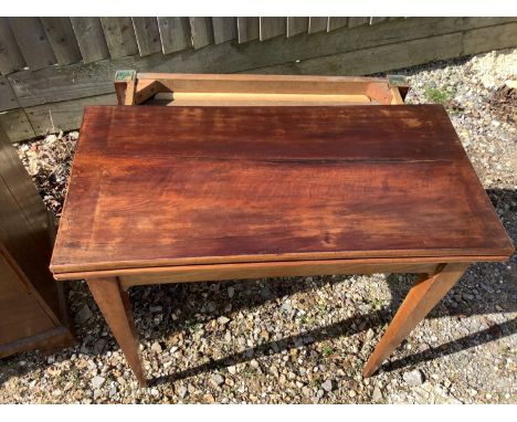 Early C19th oak straight front chest of 4 long graduated drawers with pear drop handles, cane chair and foldover card table .