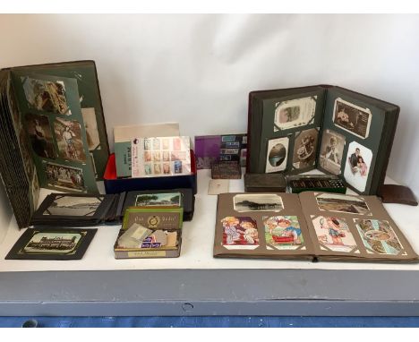 3 albums of vintage postcards, early to mid 1900s, including South coast, Dorset, churches, military camps,  WW2, and general