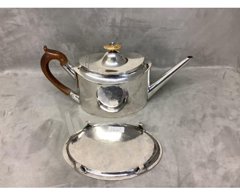 Silver tea pot and stand gross weight 28.4 ozt including handles.  Both engraved with the Arms of the De Beamorels an old Jer