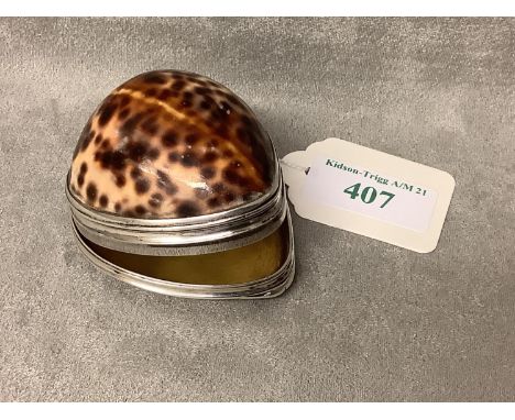 An early C19th cowrie shell snuff box with hinged silver lid Fine scratches on silver base, hinge good, no breaks or damage, 
