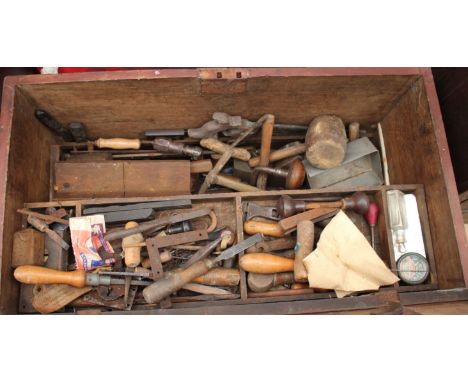 A GOLD ELM PAINTED TOOL CHEST with fitted interior containing a good number of tools to include chisels, hammers, saws, screw